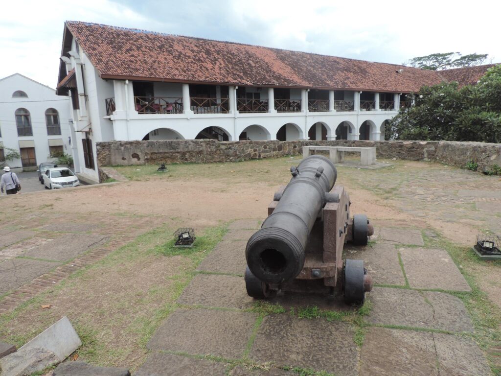 Colonial Building with war equipment